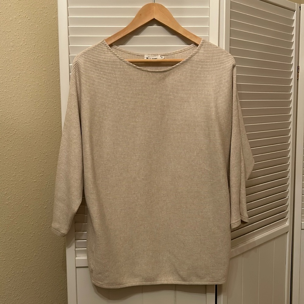 The Reset cotton 3/4 sleeve essential in oatmeal